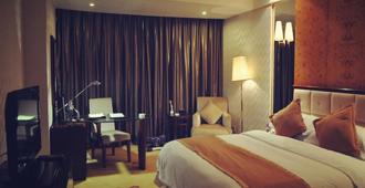 Xiangmei International Hotel - Wuxi - Schlafzimmer