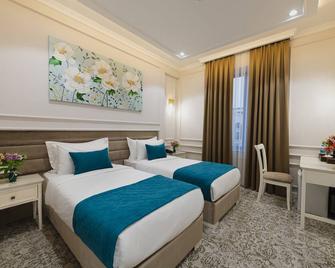 Zarafshon Parkside - Samarkanda - Habitación