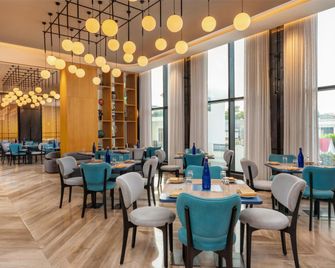 راديسون هوتل براياجراج - اللهاباد - مطعم