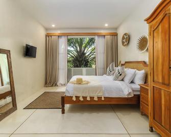 White Goose Boutique Hotel - North Kuta - Bedroom