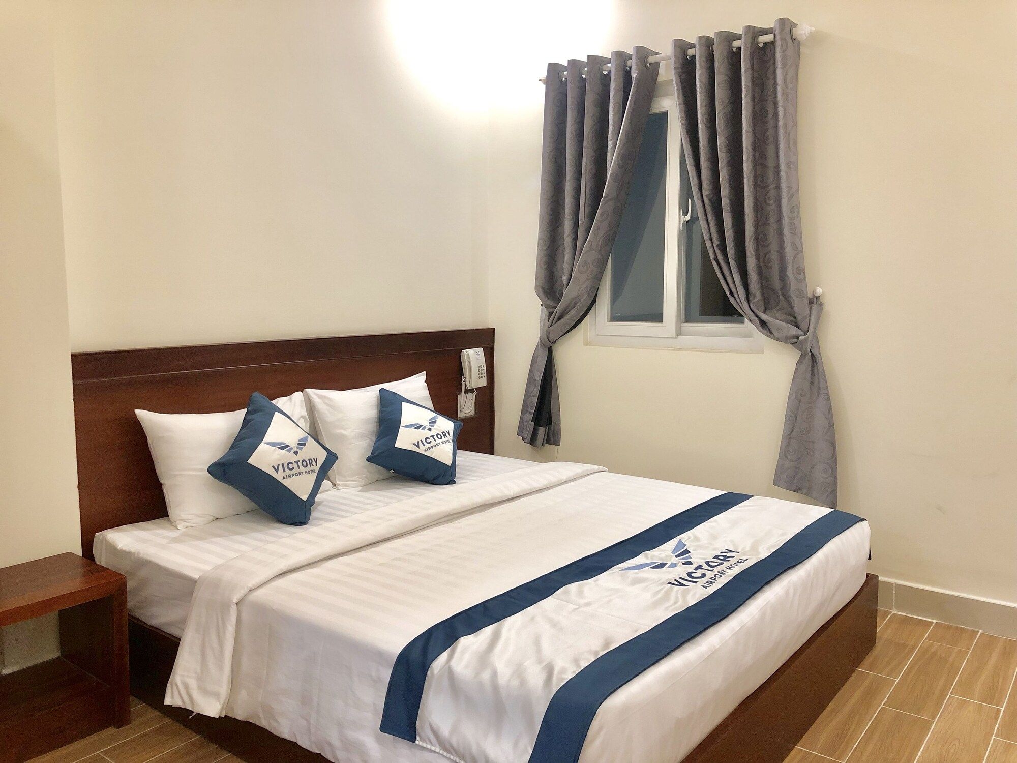 فيكتوري أيربورت هوتل - هوتشي مين سيتي - غرفة نوم