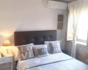 Charming House in Parada + Fireplace - Bragança - Habitació