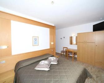 Dolomiti Hotel Olimpia - Andalo - Bedroom