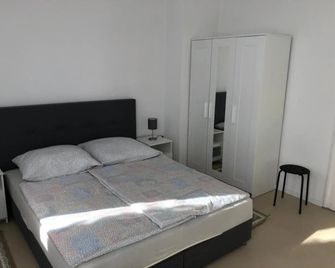 Apartment in EG Schaupenstiel - نورثيم - غرفة نوم