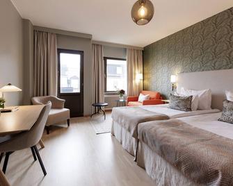 هوم هوتل ويلينجتون - ستوكهولم - غرفة نوم