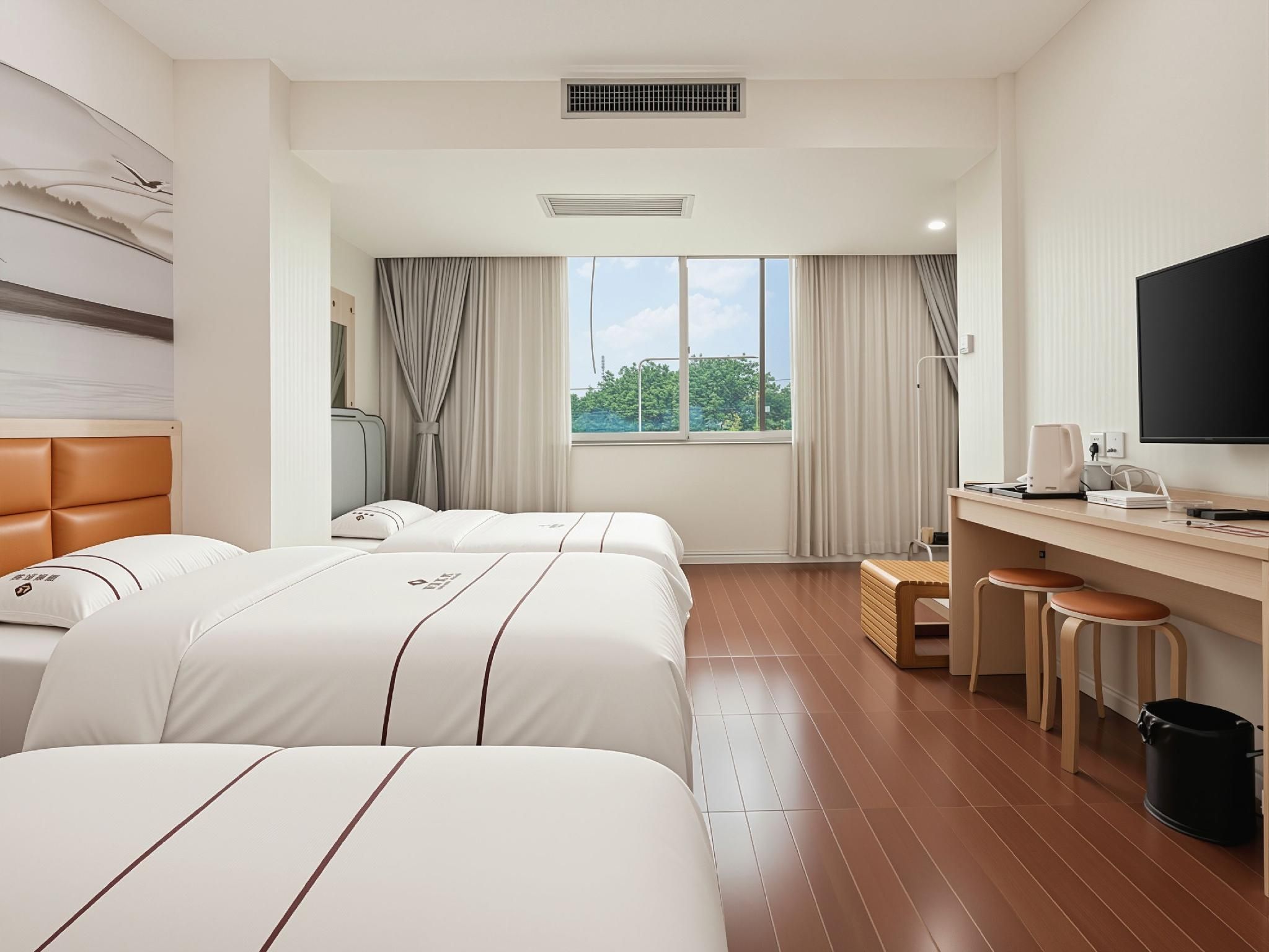 Xinzhou Hotel - גואנגג'ואו - חדר שינה