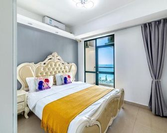 Sanya Jinshangdao Seaview Holiday Apartment - Sanya - Habitación