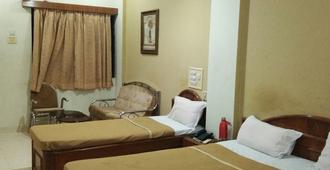 Hiriz Hotel Dollar - Bhuj - Bedroom