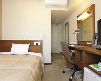 Hotel Route-Inn Ichinomiya Ekimae - Ichinomiya - Camera da letto