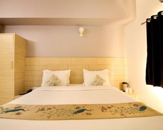 Hotel Ashish Palace - אודאיפור - חדר שינה