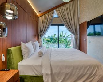 U villas - Denpasar - Schlafzimmer
