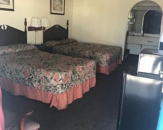 Executive Inn & Suites - Lufkin - Makuuhuone