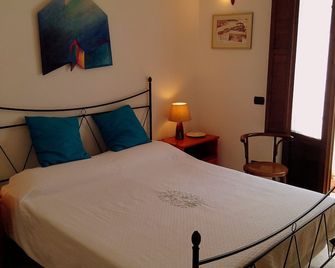 Miratrulli Apartment & Trullo dell'Aia - Alberobello - Schlafzimmer