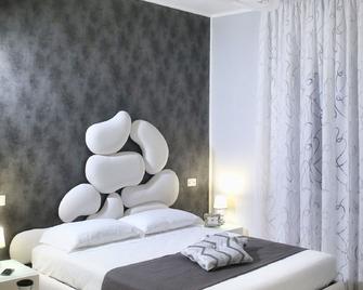 بد آند بريكفاست بومباي أوليمبوس - بومباي - غرفة نوم