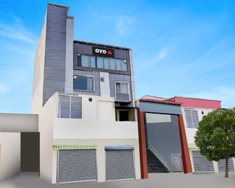 Spot On Hotel Doon Lotus Iconic Rooftop Cafe Party Hall - Clement Town - Building
