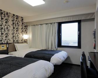 Apa Hotel Tonami Ekimae - Tonami - Camera da letto