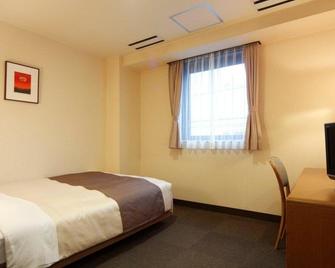 Hotel New Shizuoka - Shizuoka - Schlafzimmer