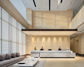 Mianyang Aowei Hotel (People's Park Branch) - Mianyang - Front desk