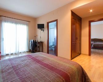 Hotel Seva - Seva - Bedroom