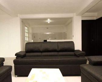 Hotel y Suites Axolotl - Chignahuapan - Huiskamer