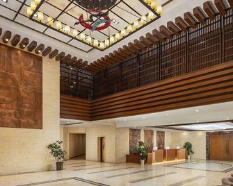 Changbai Mountain Pool West Wanda Yuehua loft Hotel - Baishan - Lobby