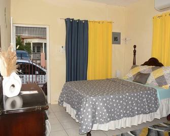 Cozy Oasis Studio - Portmore - Bedroom