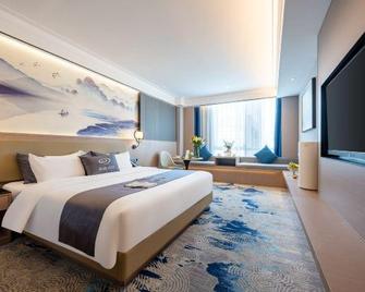 Zhongshan Jiujia International Hotel - Zhongshan - Bedroom