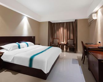 Yumeida Business Hotel (Shangqiu Normal University Pingyuan Road Campus Branch) - Shangqiu - Slaapkamer