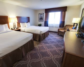 Ashmore Inn and Suites - Lubbock - Bedroom