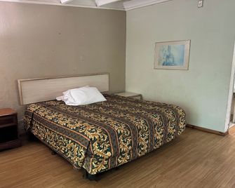 Kampus Inn By OYO Gainesville - University Area - Gainesville - Habitación