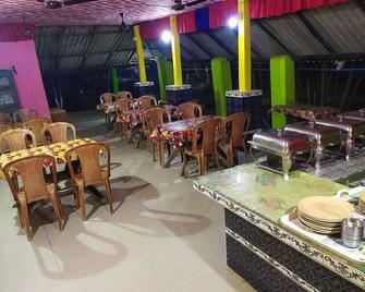 Estuarine Village Resort - Dalikainda - Restaurante