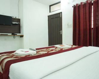 Goroomgo Pankaj Palace Jabalpur - Jabalpur - Bedroom