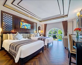 Le Pavillon Hoi An Luxury Resort & Spa - הוי אן - חדר שינה