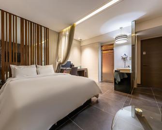 Daejeon Yuseong Bergen Hotel - Daejeon - Спальня