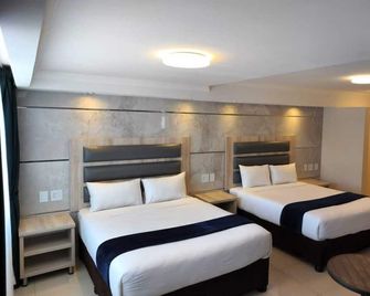 Bayside Taj Hotel - Port Shepstone - Schlafzimmer