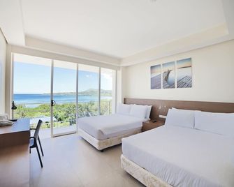 فندق أوشن سيوتس بوهول بوتيك - تاغبيلاران ستي - غرفة نوم