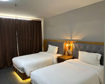 7 Days Inn Shijiazhuang Railway Station Xinshi Branch - Shijiazhuang - Slaapkamer