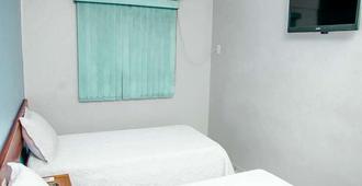 Serras Hotel - Rondonópolis - Bedroom