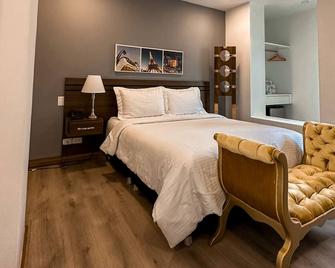 Malik Hotel Boutique - Cali - Soveværelse