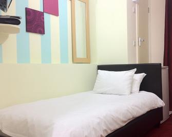 City View Hotel - Roman Road Market - לונדון - חדר שינה