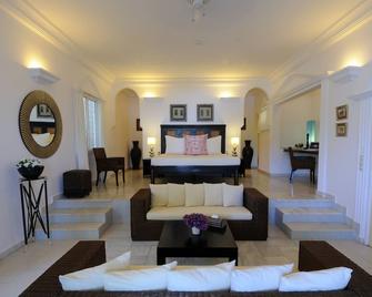 كوكو أوشن ريزورت آند سبا - سيريكوندا - غرفة نوم