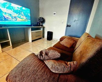 Loft Próximo ao Centro e Acessos da Cidade - Cachoeirinha - Living room