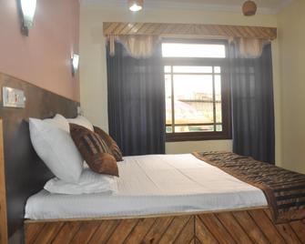 Hotel Kashmir Inn - Srinagar - Bedroom