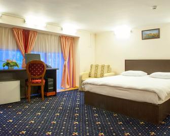 Manhattan Hotel & Restaurant - Chisinau - Phòng ngủ