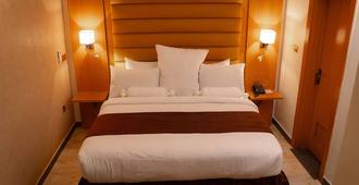 Sparklyn Hotels & Suites - Port Harcourt - Camera da letto