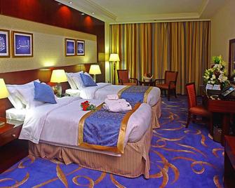 Emaar Royal Hotel Al Madina - Medina - Bedroom