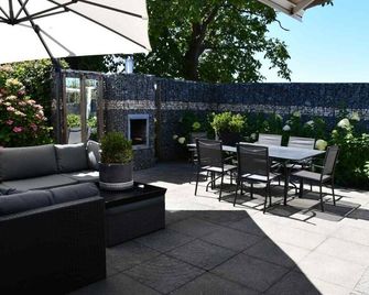 Vacation home Flevoland - with terrace, garden and jacuzzi - Dronten - Pátio