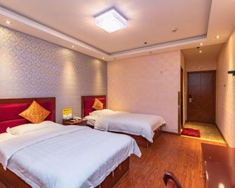 Chongqing Vikeduo Business Hotel (Banan Huaxi University of Technology) - Chongqing - Habitación