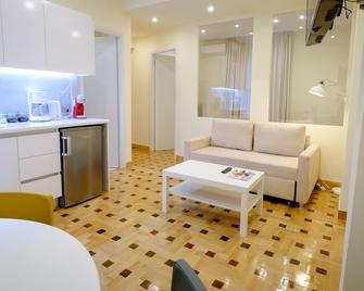 Kolonaki Suites by Olala Homes - Athens - Living room