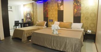Hotel Dreamworld North Edsa - קזון סיטי - חדר שינה